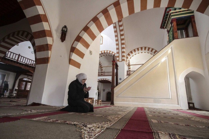 A woman prays in a mosque in the Crimean town of Yevpatorya