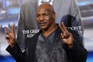 Mike Tyson poses at the premiere of &quot;Draft Day&quot; in Los Angeles