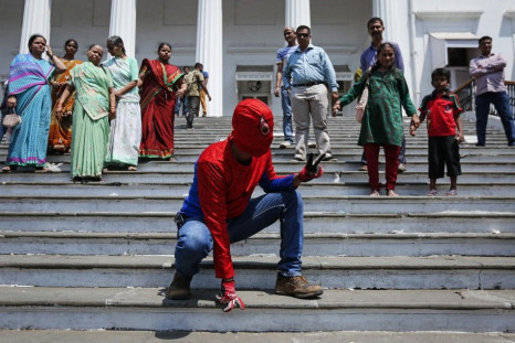 Gaurav Sharma, an independent candidate also known as the Indian Spider-Man, poses as he arrives to file his nomination for the upcoming general election in Mumbai
