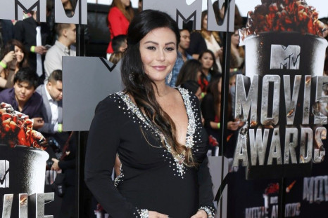 Jennifer Farley, also known as JWoww, arrives at the 2014 MTV Movie Awards in Los Angeles, California  April 13, 2014.  REUTERS/Danny Moloshok 