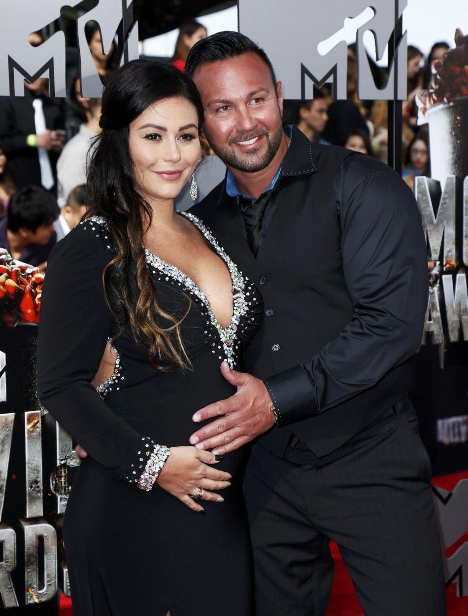 Jennifer Farley, also known as JWoww, poses with her fiance Roger Mathews upon arrival at the 2014 MTV Movie Awards in Los Angeles, California  April 13, 2014.  REUTERSDanny Moloshok  