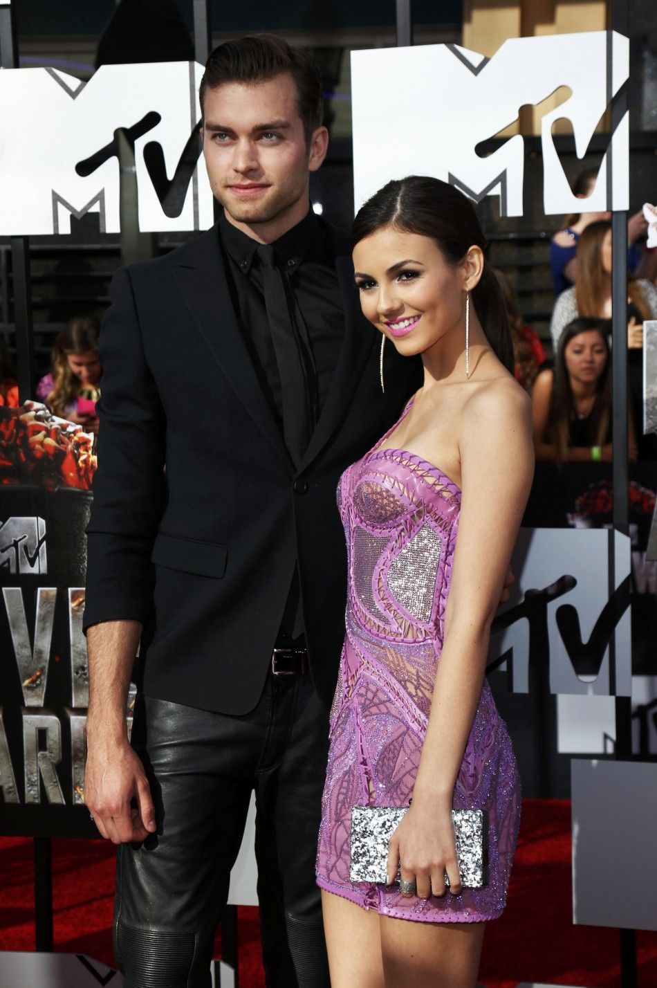 Pierson Fode and Victoria Justice arrive at the 2014 MTV Movie Awards in Los Angeles, California  April 13, 2014.  REUTERSDanny Moloshok 