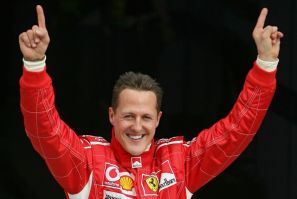 File photo of Ferrari Formula One Driver Michael Schumacher of Germany Celebrates After Taking the Pole Position at the End of the Qualifying Session for the Bahrain Formula One Grand Prix at the Sakhir Racetrack in Manama