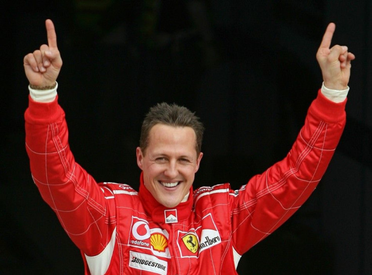 File photo of Ferrari Formula One Driver Michael Schumacher of Germany Celebrates After Taking the Pole Position at the End of the Qualifying Session for the Bahrain Formula One Grand Prix at the Sakhir Racetrack in Manama