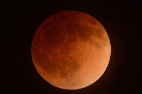 The moon is shown in eclipse from Los Angeles (Reuters)