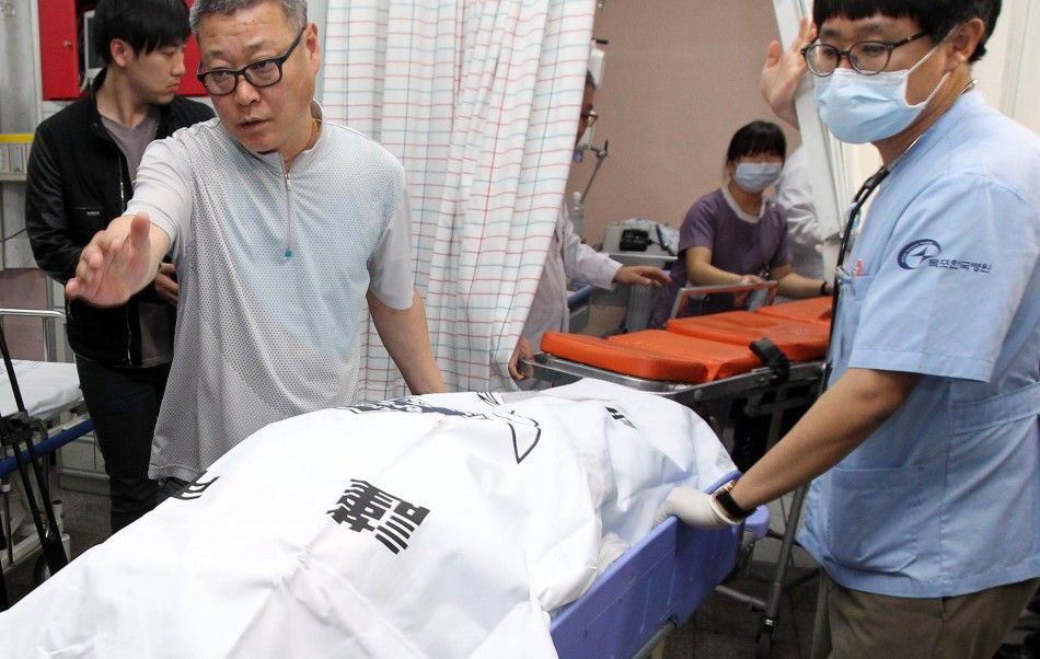A body of a passenger who was on the South Korean ferry quotSewolquot which sank in the sea off Jindo is carried into a hospital in Jindo April 16, 2014. More than 280 people, many of them students from the same high school, were missing after a ferry