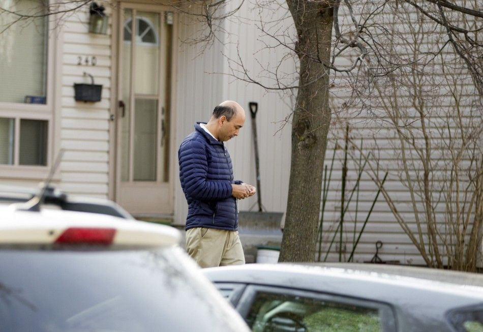 Roberta Solis-Oba, father of Stephen Arthuro Solis-Reyes who has been charged in connection with exploiting the quotHeartbleedquot bug to steal taxpayer data from a government website, leaves the family home in London, Ontario April 16, 2014. The susp