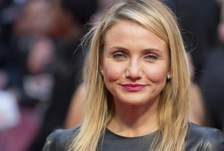 Actress Cameron Diaz Poses for Photographers as She Arrives for the UK Gala Screening of 'The Other Woman' in London