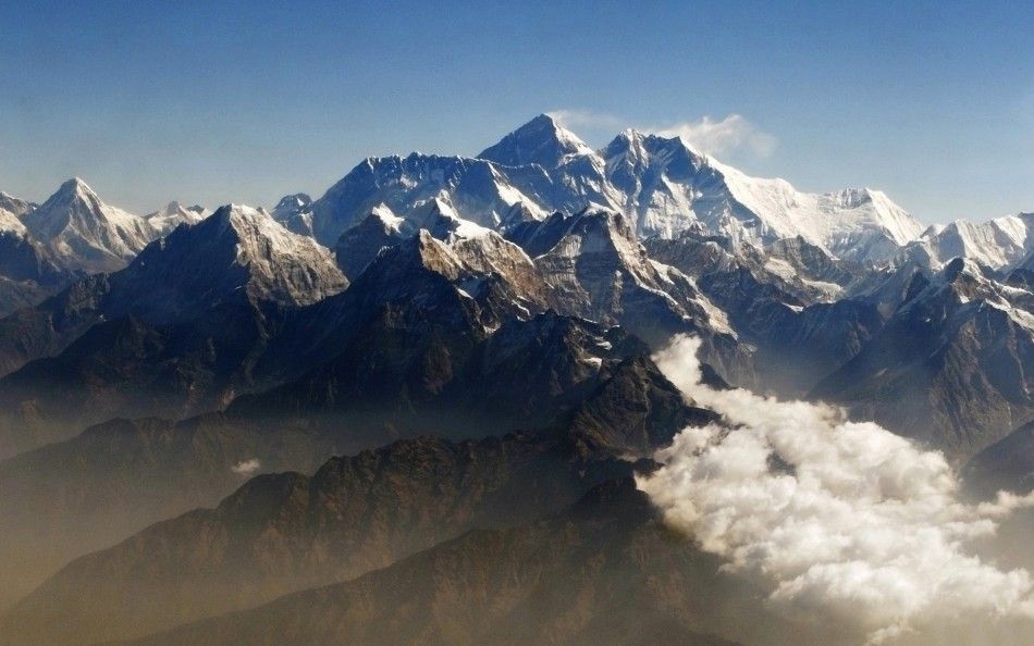Mount Everest C, the worlds highest peak, and other peaks of the Himalayan range are seen from air during a mountain flight from Kathmandu, in this file picture taken April 24, 2010. REUTERSTim ChongFiles