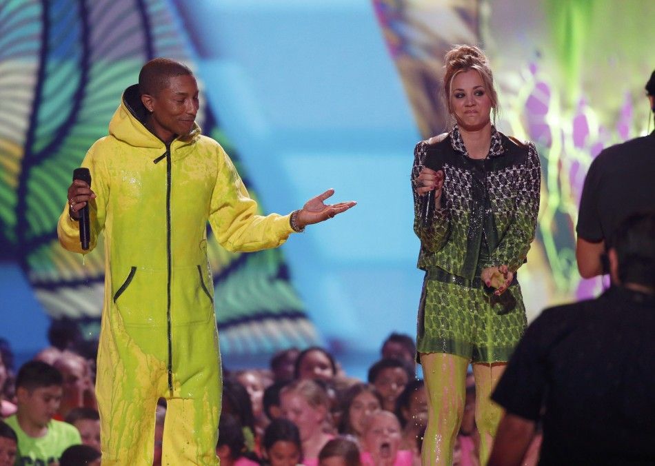 Musician Pharrell Williams and actress Kaley Cuoco react after getting quotslimedquot on stage at the 27th Annual Kids Choice Awards in Los Angeles, California March 29, 2014.   REUTERSMario Anzuoni