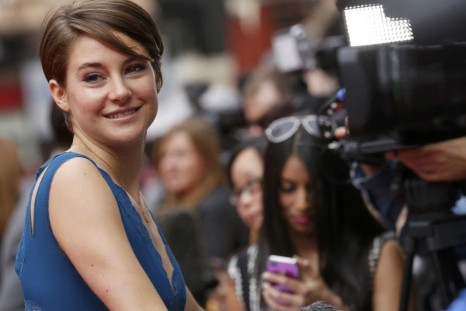 Shailene Woodley smiles as she arrives for the European premiere of &quot;Divergent&quot; at Leicester Square in London