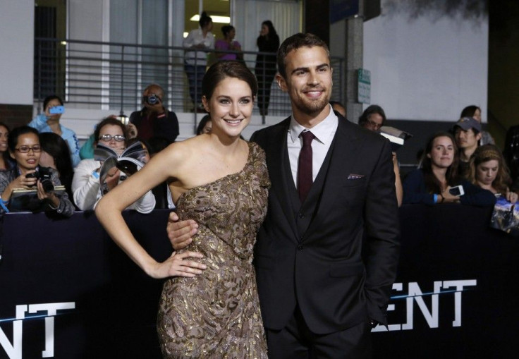 Cast members Shailene Woodley and Theo James pose at the premiere of &quot;Divergent&quot; in Los Angeles
