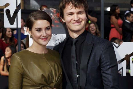 Actress Shailene Woodley and actor Ansel Elgort arrive at the 2014 MTV Movie Awards in Los Angeles
