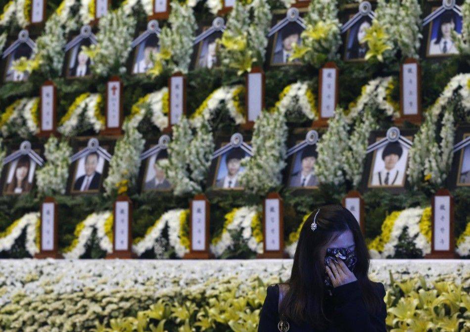 A mourner cries as she pays tribute to victims of the sunken passenger ship Sewol, at a temporary group memorial altar for the victims in Ansan April 27, 2014. South Korean Prime Minister Chung Hong-won announced his resignation on Sunday over the governm