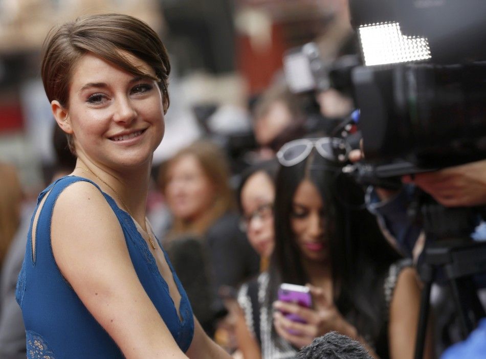 Actress Shailene Woodley smiles as she arrives for the European premiere of quotDivergentquot at Leicester Square in London March 30, 2014.  REUTERSLuke Macgregor