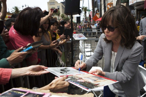 Actress Sally Field signs autographs after unveiling her star on the Walk of Fame in Hollywood