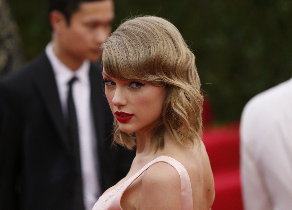 Singer Taylor Swift arrives at the Metropolitan Museum of Art Costume Institute Gala Benefit celebrating the opening of quotCharles James Beyond Fashionquot in Upper Manhattan, New York, May 5, 2014.  REUTERSLucas Jackson
