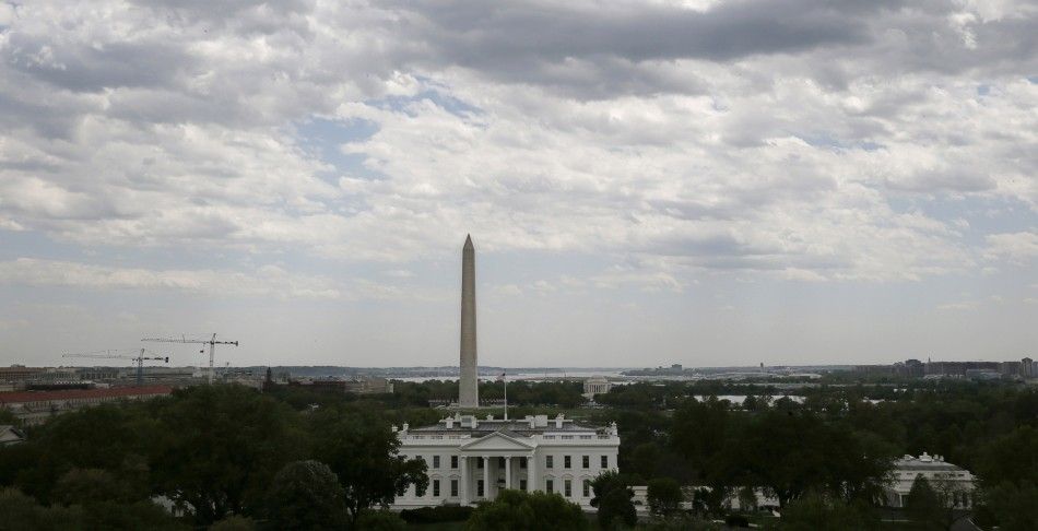 The White House, the Washington Monument and the Jefferson Memorial are seen from atop the roof of the historic Hay Adams hotel in Washington, May 4, 2014. REUTERSJim Bourg