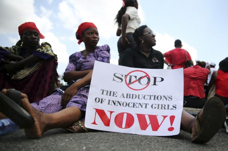 Women protest demanding the release of abducted secondary school girls from the remote village of Chibok, in Lagos
