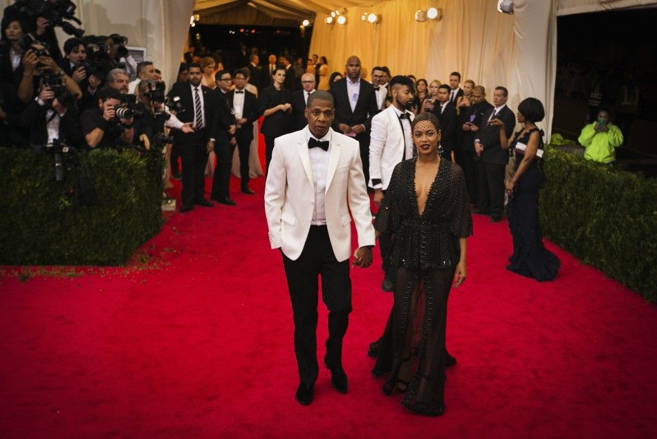 Beyonce and her husband Jay-Z arrive at the Metropolitan Museum of Art Costume Institute Gala Benefit celebrating the opening of quotCharles James Beyond Fashionquot in Upper Manhattan, New York