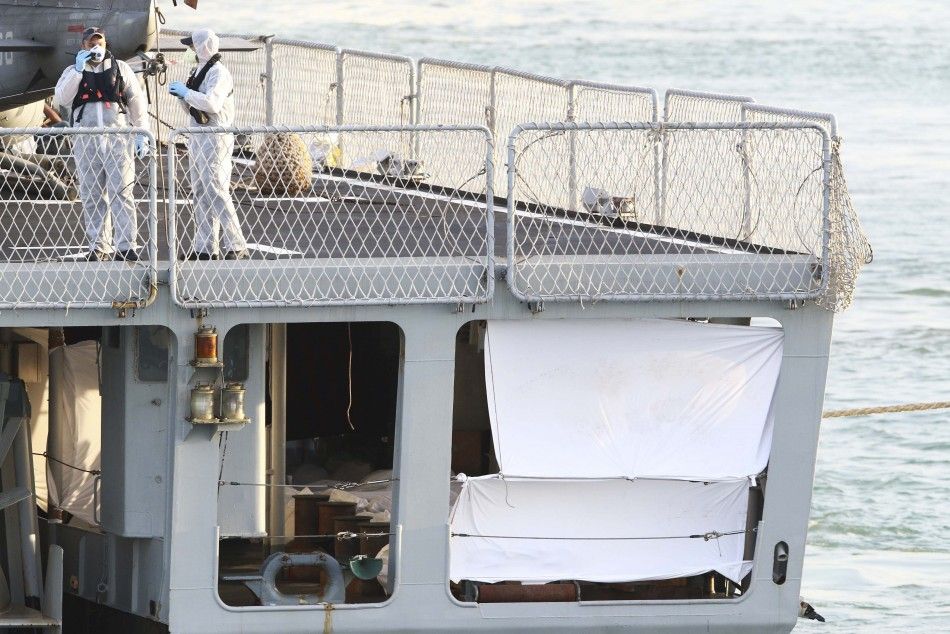 Bodies lower deck of migrants are seen aboard of the Italian frigate quotGrecalequot as it arrives at the Catania harbour in the Italian island of Sicily May 13, 2014. Italian naval and coast guard vessels recovered 14 bodies and rescued around 200 
