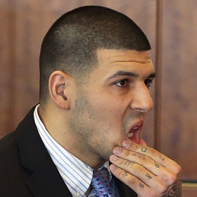 Aaron Hernandez appears for a pre-trial hearing at Bristol County Superior Court in Fall River, Massachusetts in this February 7, 2014 file photo. Hernandez, the former New England Patriots NFL football player, already awaiting trial on charges of shootin