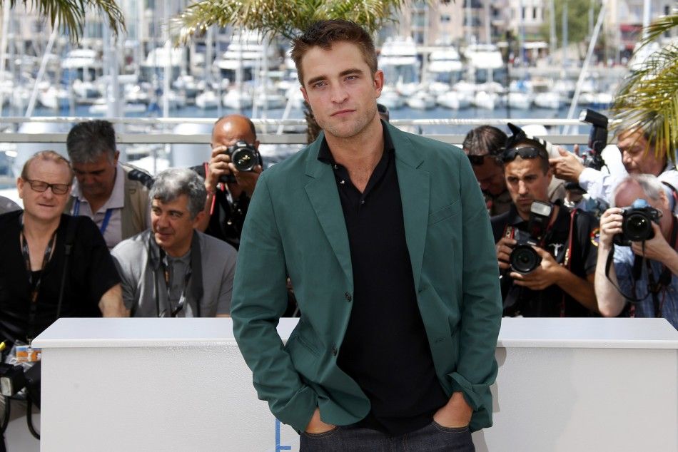 Cast member Robert Pattinson poses during a photocall for the film quotThe Roverquot out of competition at the 67th Cannes Film Festival in Cannes