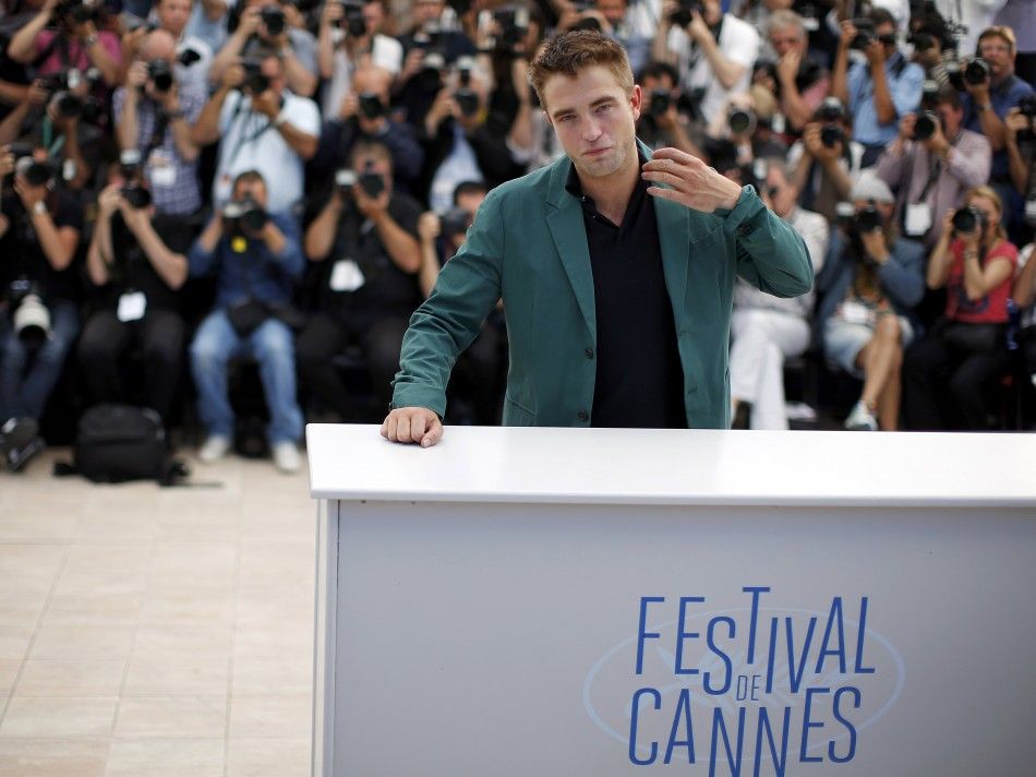 Cast member Robert Pattinson poses during a photocall for the film quotThe Roverquot out of competition at the 67th Cannes Film Festival in Cannes