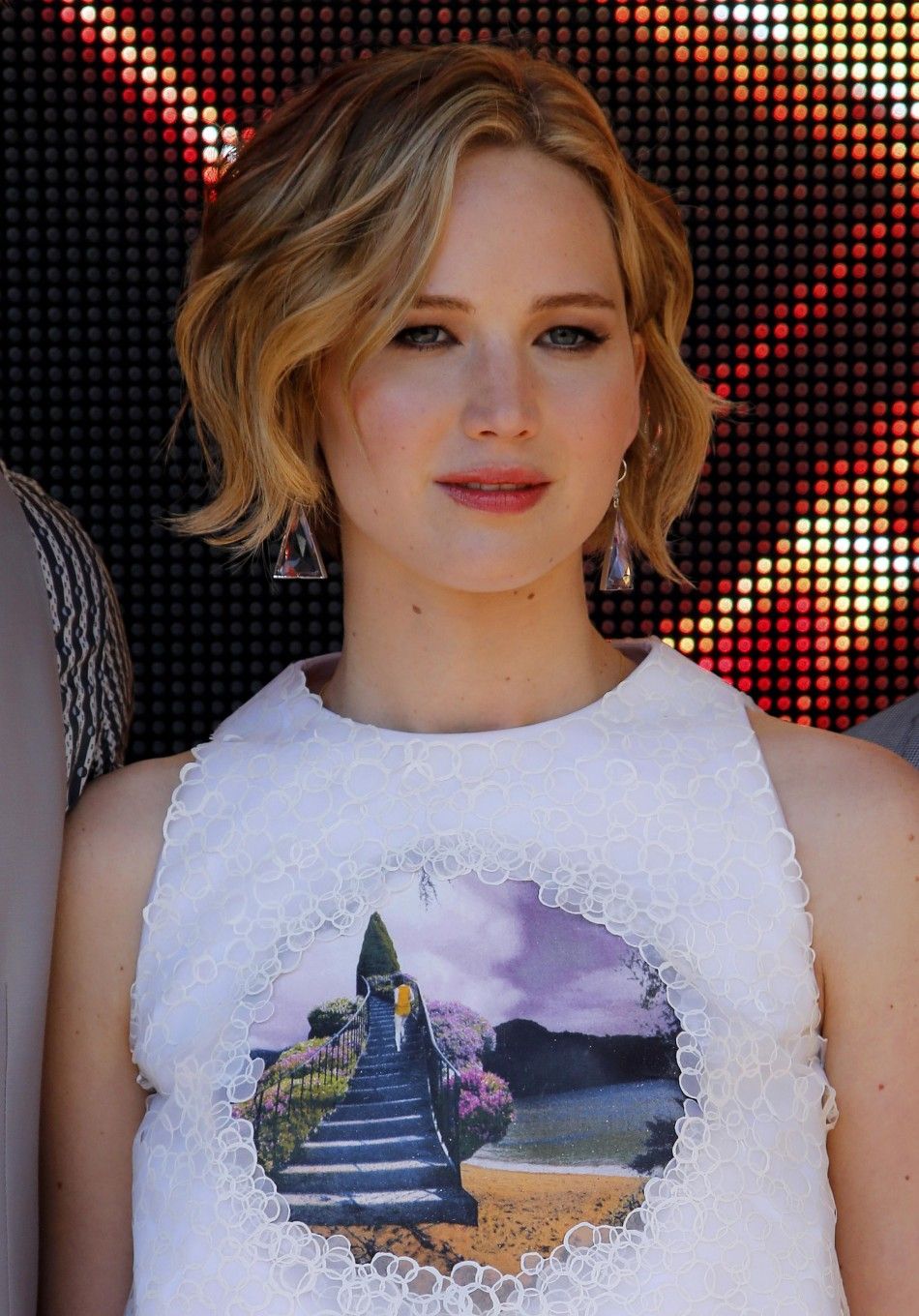 Jennifer Lawrence poses during a photocall for the film quotThe Hunger Games  Mockingjay - Part 1quot at the 67th Cannes Film Festival 