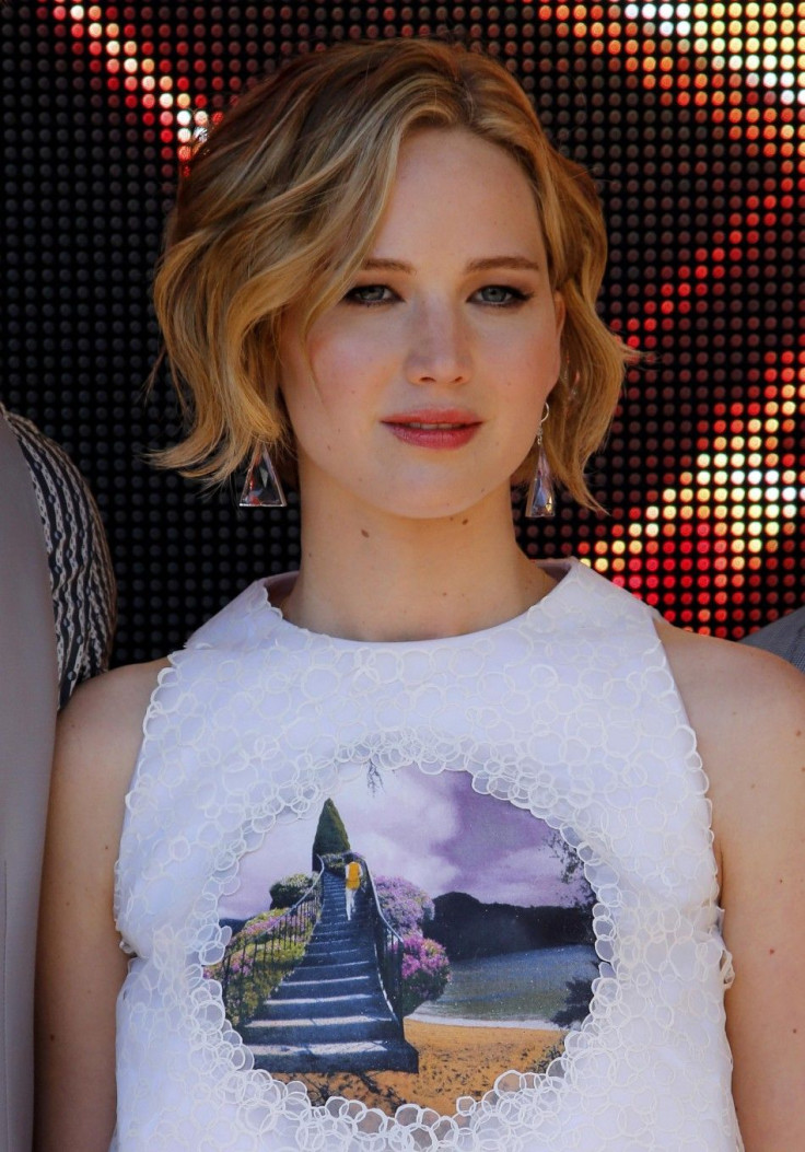 Jennifer Lawrence poses during a photocall for the film &quot;The Hunger Games : Mockingjay - Part 1&quot; at the 67th Cannes Film Festival 
