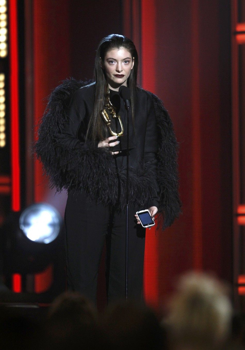 Singer Lorde accepts the top new artist award onstage at the 2014 Billboard Music Awards in Las Vegas