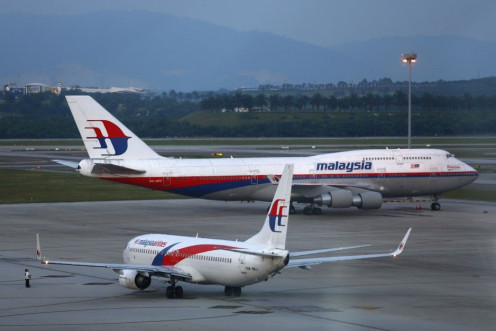File photo of Malaysia Airlines aircrafts taxiing on the runway at Kuala Lumpur International Airport in Sepang outside Kuala Lumpur