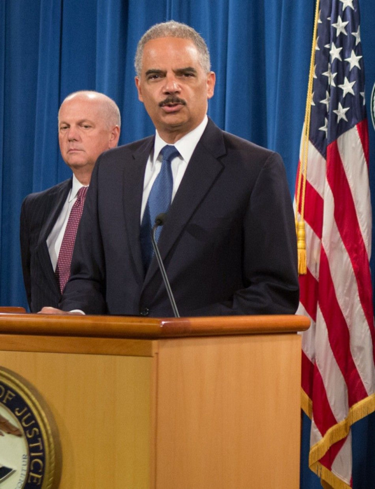 U.S. Attorney General Holder announces cyber espionage indictments during news conference at the Justice Department in Washington