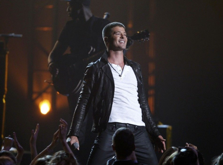 Singer Robin Thicke performs &quot;Get Her Back&quot; at the 2014 Billboard Music Awards in Las Vegas