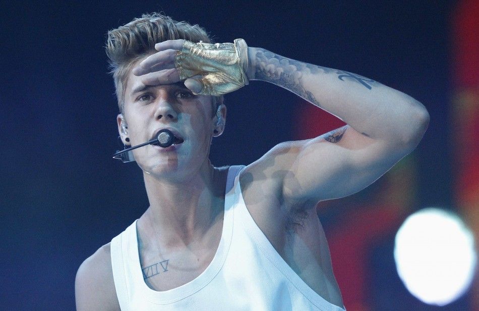 Singer Justin Bieber performs at Staples Center during his Believe Tour in Los Angeles, California 