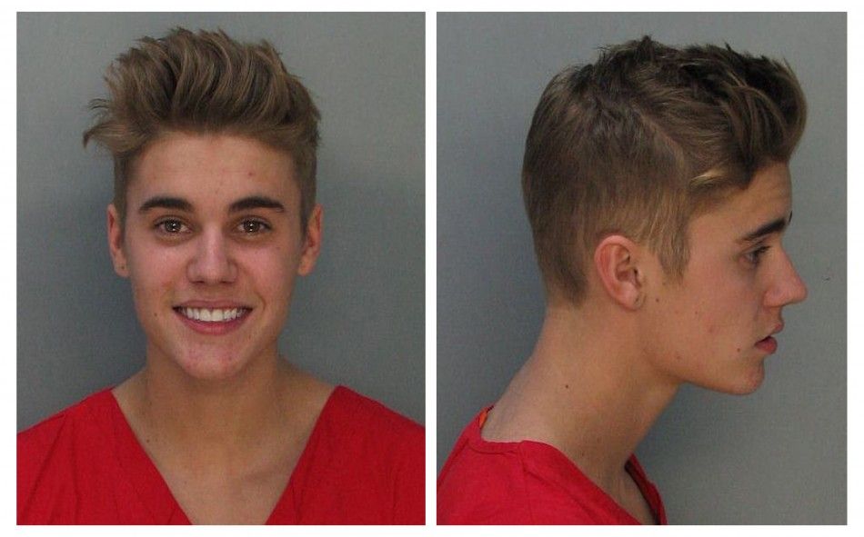 Canadian teen pop singer Justin Bieber is shown in this combo of file booking photos provided by the Miami-Dade Corrections and Rehabilitation Department in Miami, Florida on January 23, 2014. The singers trial in Miami on driving under the influence, re