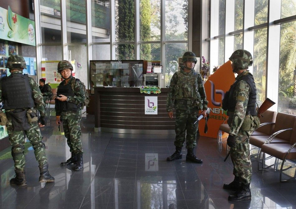Thai soldiers occupy the foyer of the National Broadcasting Services of Thailand television station in Bangkok May 20, 2014.
