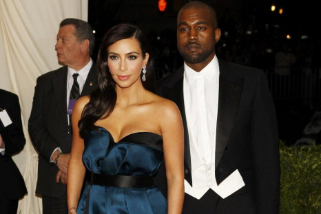 Kim Kashdashian and Kanye West arrive at the Metropolitan Museum of Art Costume Institute Gala Benefit celebrating the opening of &quot;Charles James: Beyond Fashion&quot; in Upper Manhattan, New York May 5, 2014. REUTERS/Carlo Allegri  