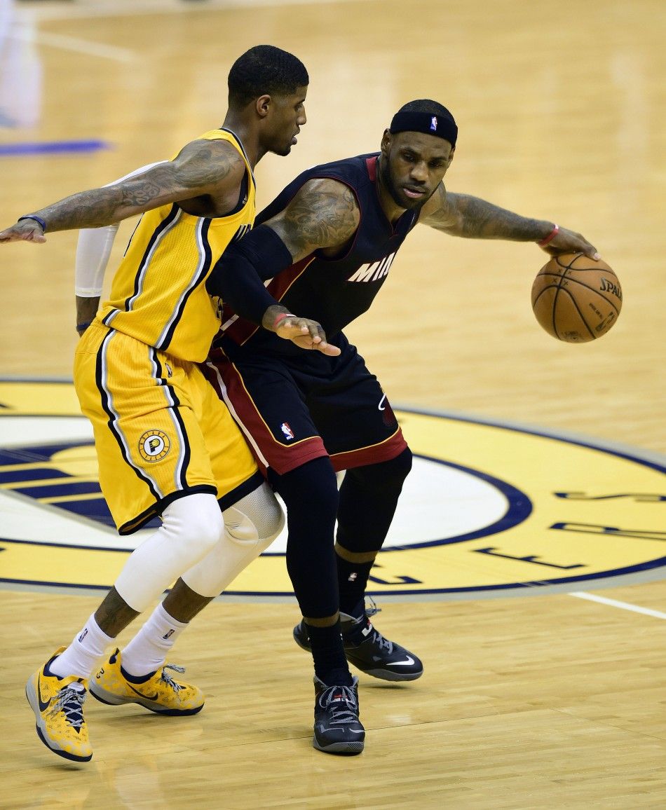 May 20, 2014 Indianapolis, IN, USA Miami Heat forward LeBron James 6 drives against Indiana Pacers forward Paul George 24 during the second half of game two of the Eastern Conference Finals of the 2014 NBA Playoffs at Bankers Life Fieldhouse. The Mi