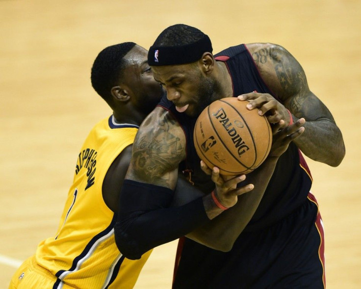 May 20, 2014; Indianapolis, IN, USA; Miami Heat forward LeBron James (6) leans in to Indiana Pacers guard Lance Stephenson (1) during the second half of game two of the Eastern Conference Finals of the 2014 NBA Playoffs at Bankers Life Fieldhouse. The Mia