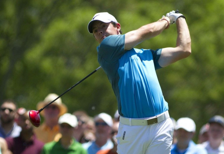 May 4, 2014; Charlotte, NC, USA; Rory McIlroy tees off on the fourth hole during the final round of the Wells Fargo Championship at Quail Hollow Club.