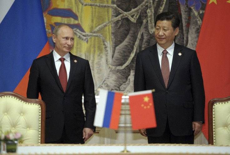Russia&#039;s President Putin and China&#039;s President Xi Jinping attend a signing ceremony in Shanghai