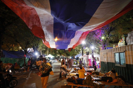 Anti-government protesters get ready to leave their main encampment after the coup was declared in Bangkok May 22, 2014. Thailand's army chief General Prayuth Chan-ocha took control of the government in the coup on Thursday saying the army had to restore 