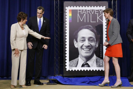 House Minority Leader Nancy Pelosi (L) talks with President of the Harvey Milk Foundation Stuart Milk (C), next to U.S. Ambassador to the UN Samantha Power, after they unveiled the Harvey Milk Forever Stamp at its dedication ceremony at the White House in
