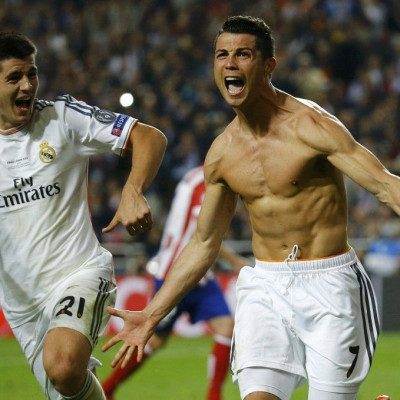 Real Madrid's Cristiano Ronaldo (R) celebrates with team mate Alvaro Morata
