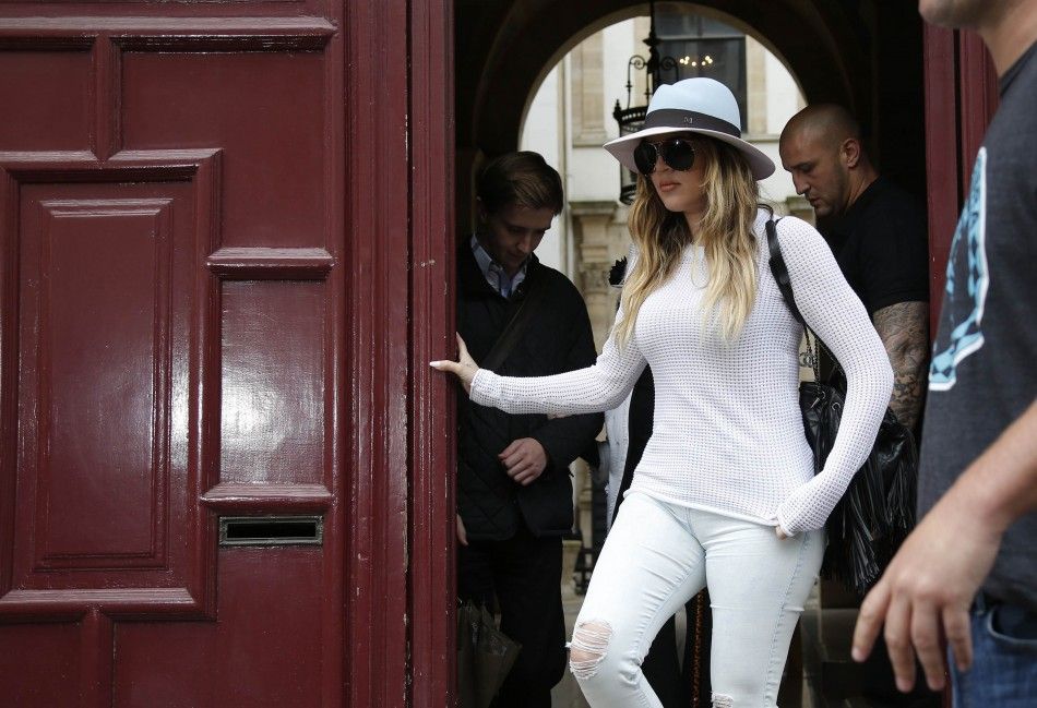 Television Personality Khloe Kardashian Leaves an Apartment Building in Paris