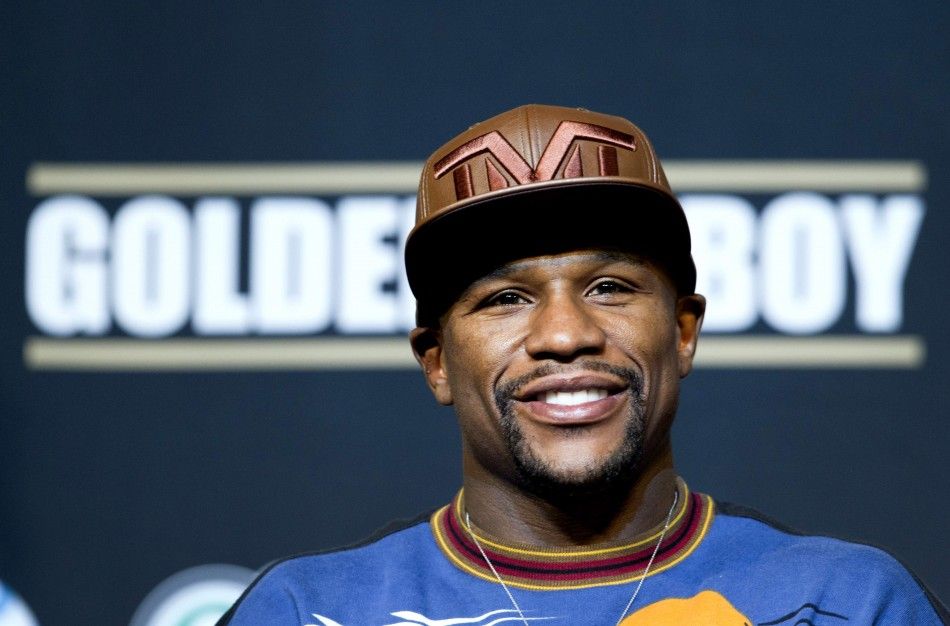WBC welterweight champion Floyd Mayweather Jr. of the U.S. attends a news conference at the MGM Grand Hotel and Casino in Las Vegas, Nevada, April 30, 2014. Mayweather will take on WBA welterweight champion Marcos Maidana of Argentina in a WBCWBA unifica