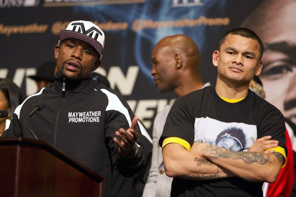 Floyd Mayweather Jr. L of the U.S. and Marcos Maidana of Argentina hold a media conference following their WBCWBA welterweight unification fight at the MGM Grand Garden Arena in Las Vegas, Nevada, May 3, 2014. REUTERSSteve Marcus 