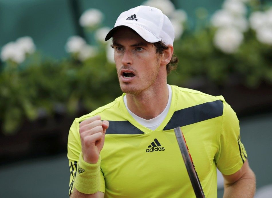 Andy Murray of Britain reacts after winning his mens singles match against Andrey Golubev of Kazakhstan at the French Open tennis tournament at the Roland Garros stadium in Paris May 27, 2014. 