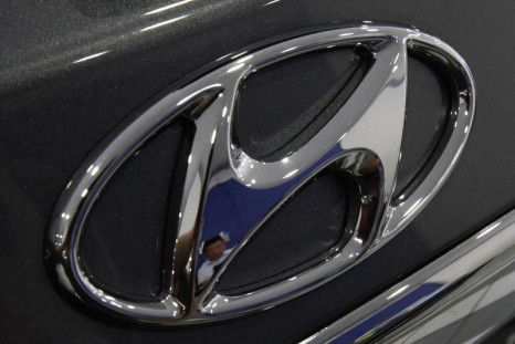 The logo of Hyundai Motor is seen on a car displayed at a Hyundai dealership in Seoul July 26, 2012. REUTERS/Kim Hong-Ji